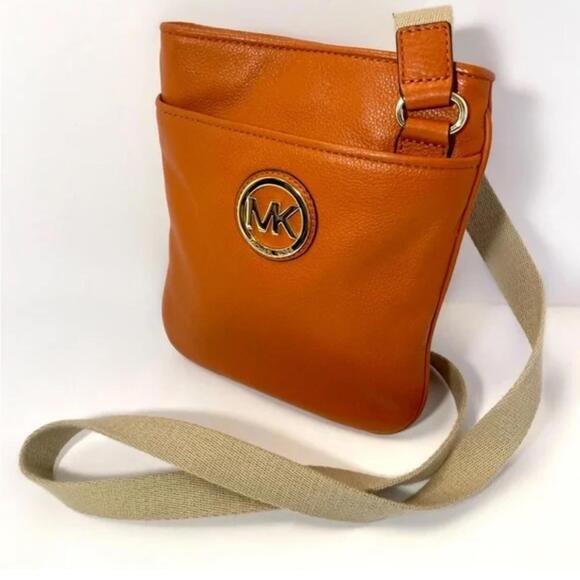 Michael Kors Handbags - EUC Michael Kors Orange Pebbled Leather Crossbody Bag